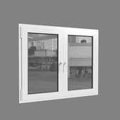 a small white metal-plastic window