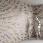 the wall is made of multicolored brick relief