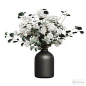 bouquet of eucalyptus and hydrangea in a vase