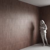 the wall is made of red relief tiles