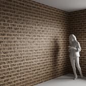 a brick wall with flecks of stone