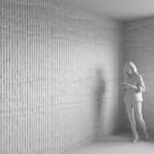 the wall is made of gray concrete in relief