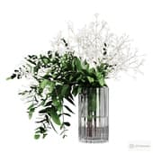 branches of eucalyptus and gypsophila in a vase