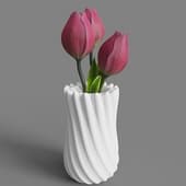 tulips in a white relief vase