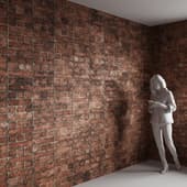 the wall is made of old red brick with an unusual layout