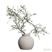 a sprig of eucalyptus in a vase.