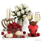 romantic set with desserts, raspberries and champagne