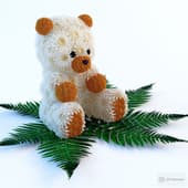 a bear made of flowers (chrysanthemums and dandelions).